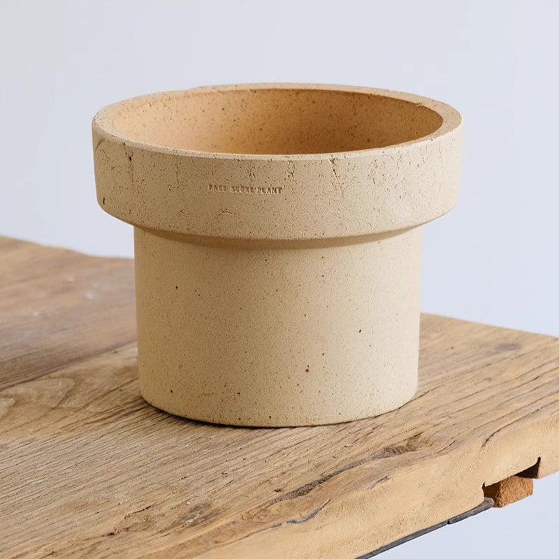 7-inch white cone-shaped terracotta cone planter with a wide rim, perfect for indoor plants; natural clay pot adds earthy elegance to home decor.